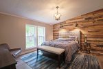 Master bedroom with a queen bed